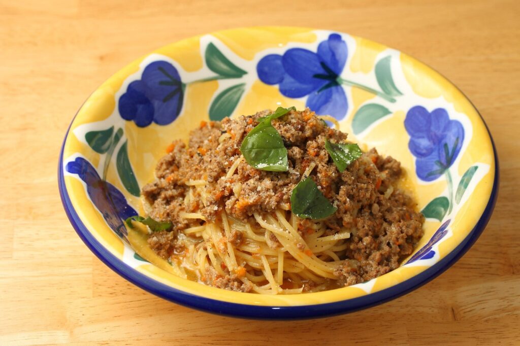 アダッキオの肉たっぷりナポリ伝統の白ワイン煮込み ジェノベーゼスパゲッティ